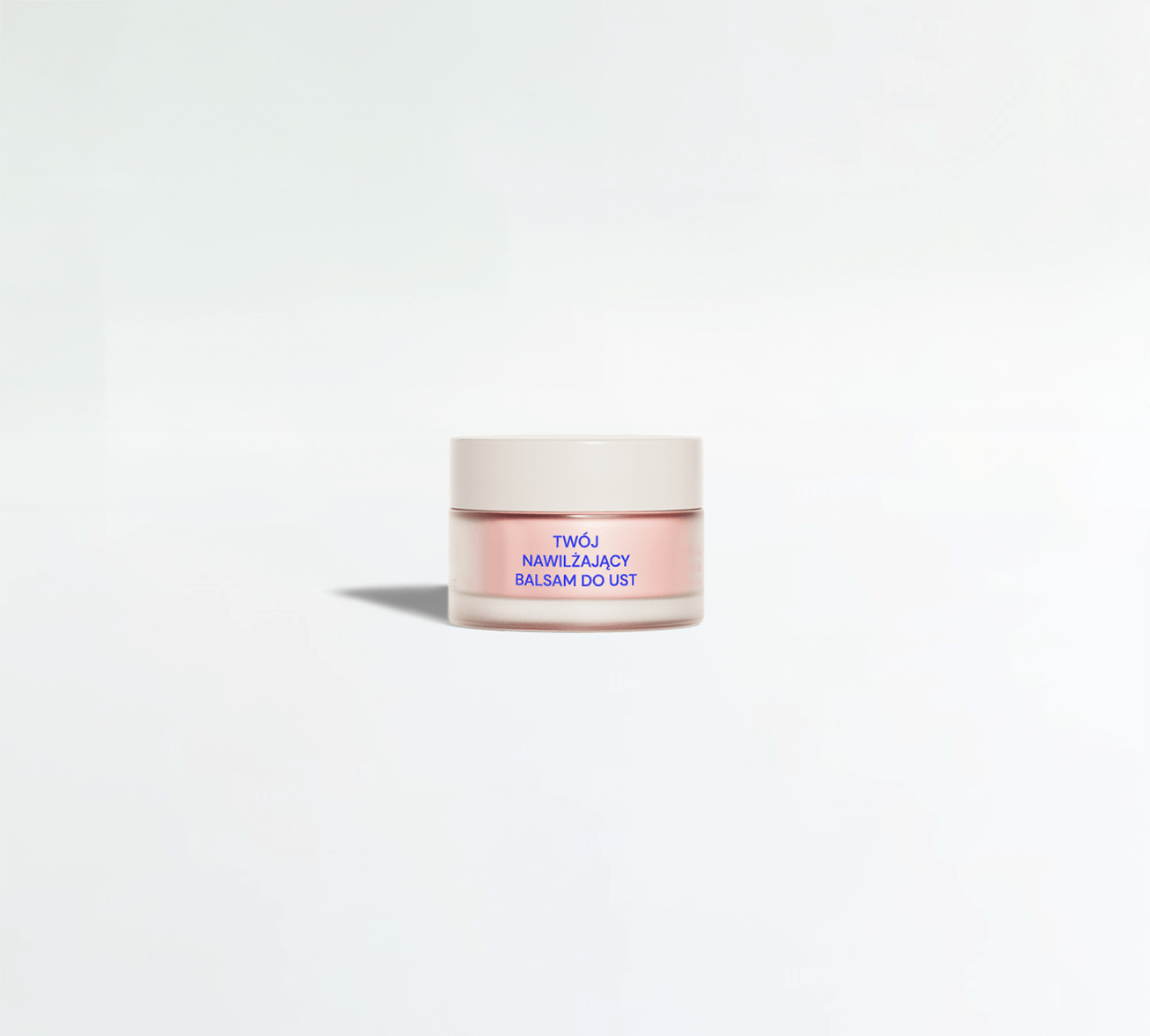 Elegant jar of Private Label Hydrating Lip Balm with a soft pink hue, designed to deeply nourish, moisturize, and protect lips with premium natural ingredients.